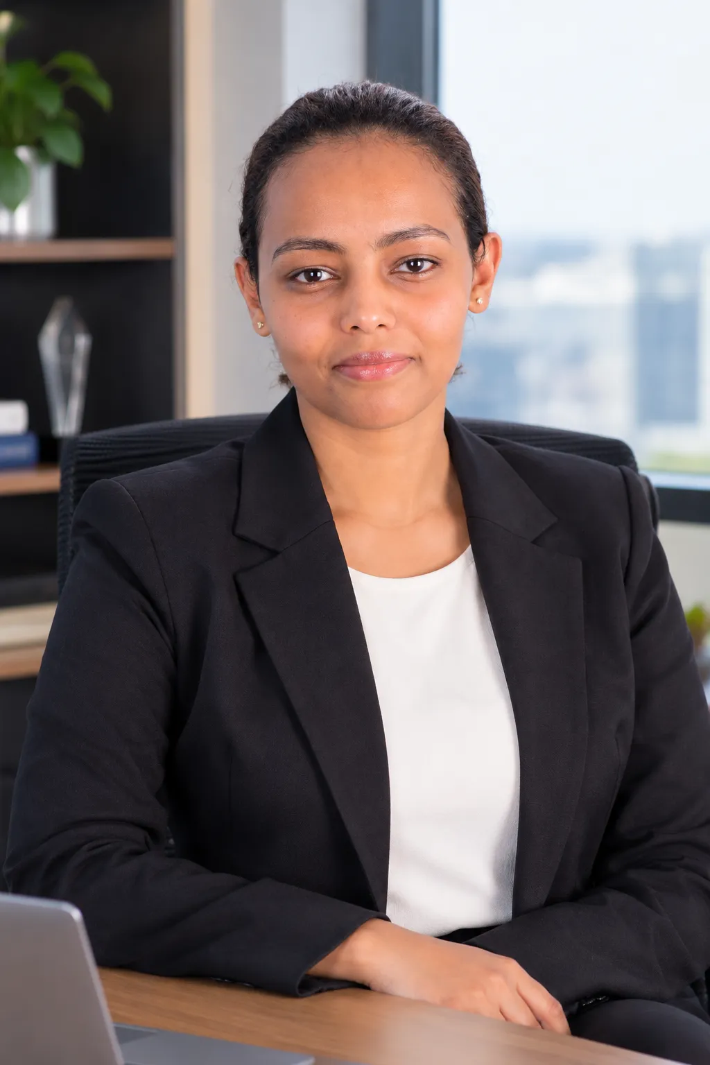 Eng. Abenezer Walelgn Lemma, COO of Inteltech, at her desk