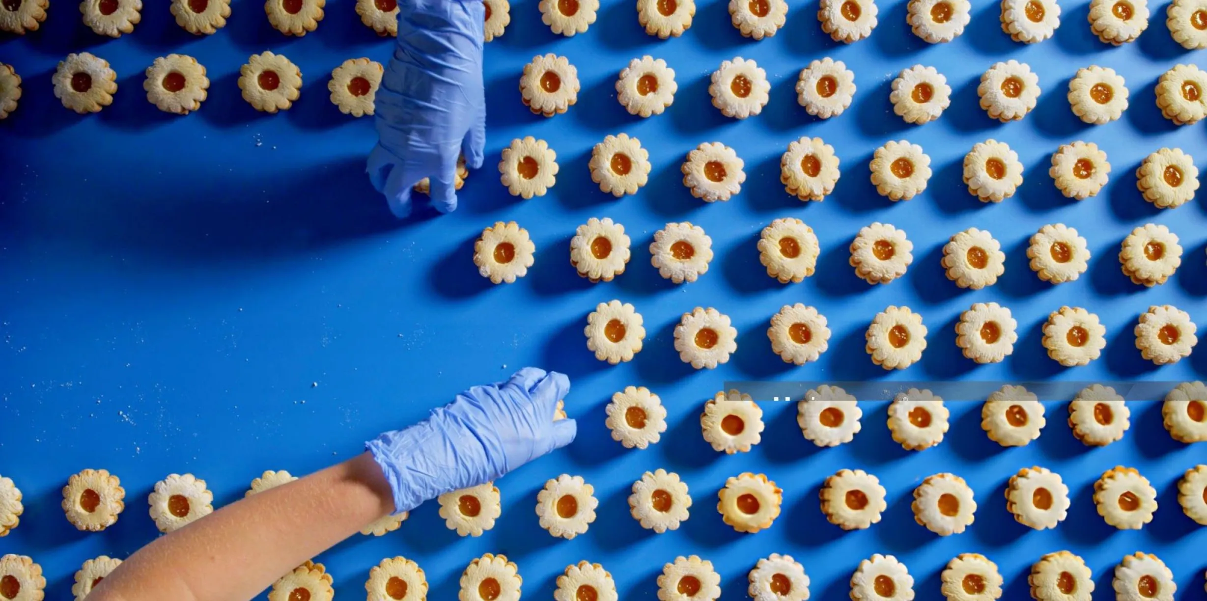 A food production line with products moving along a conveyor